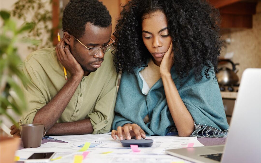 couple looking at expenses